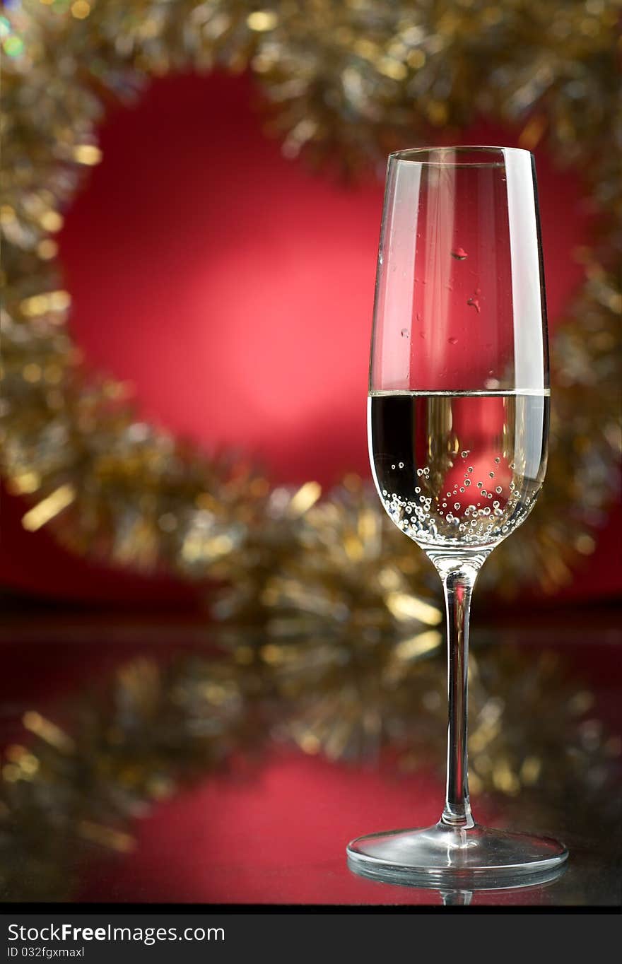 Champagne in glasses on a red background. Champagne in glasses on a red background