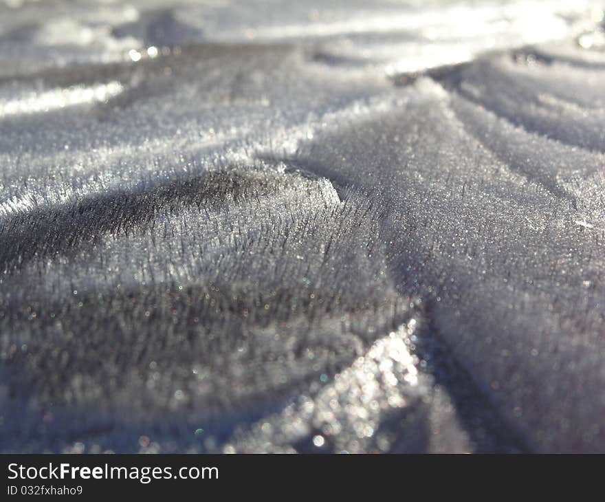 An icy pattern on a car one frosty morning. An icy pattern on a car one frosty morning.