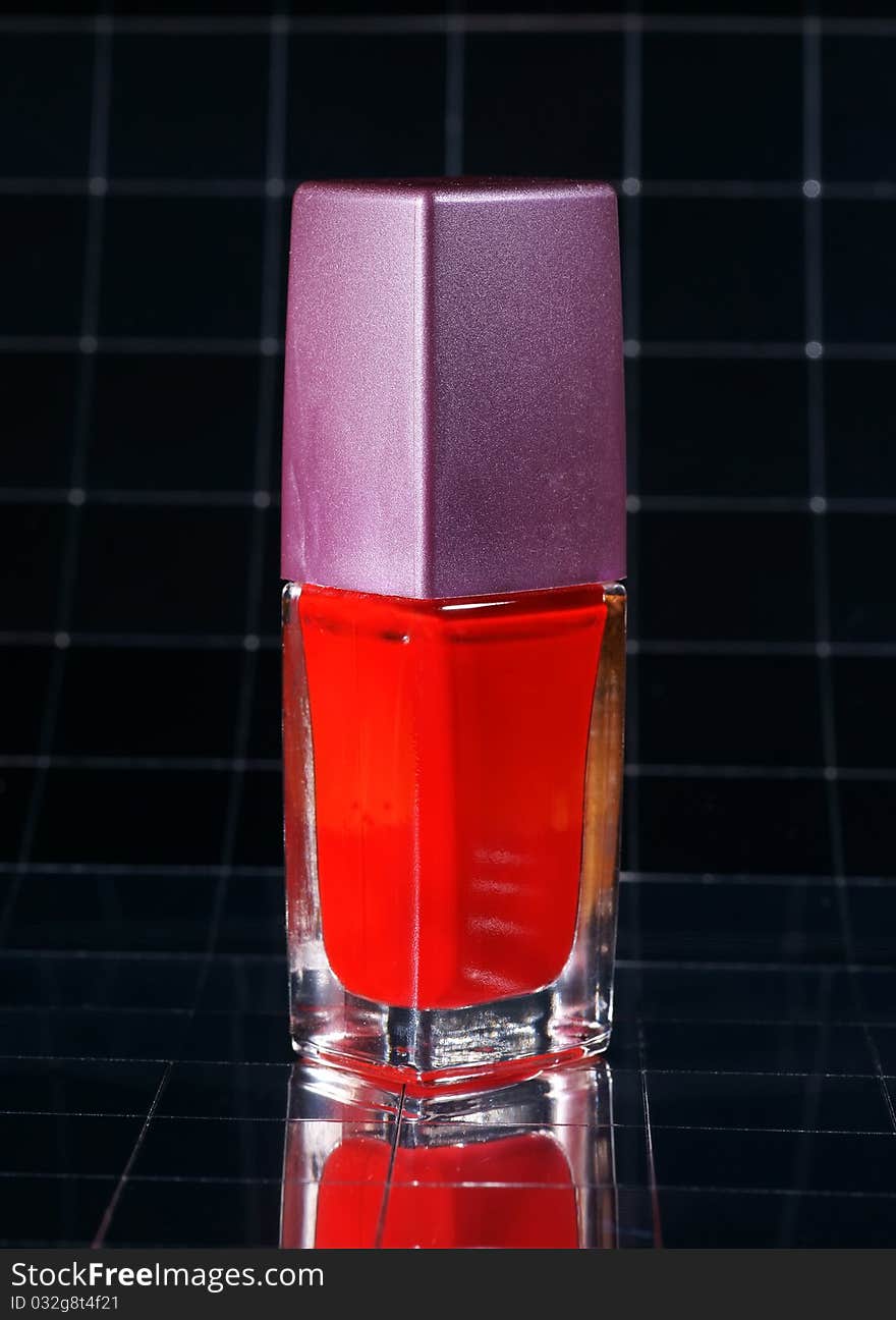 Red nail polish with reflexion