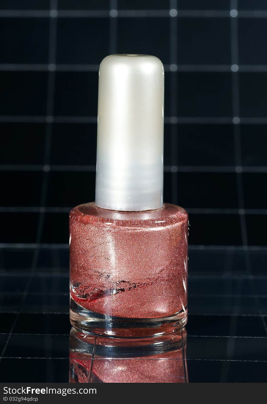 Nail polish pink nacre with reflexion