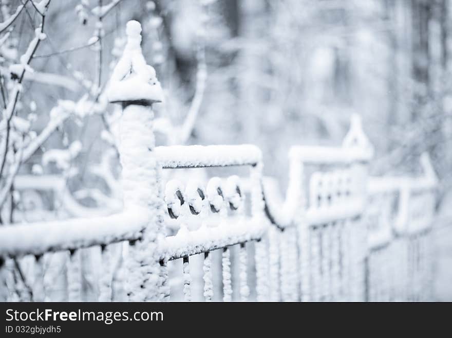 Winter park fence in snow - shallow DOF. Winter park fence in snow - shallow DOF