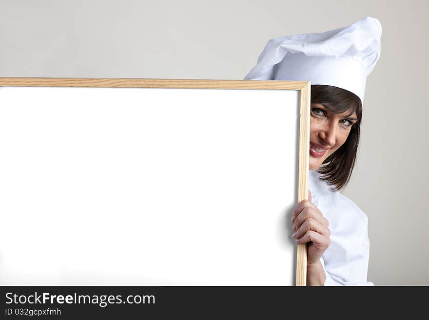 Beautiful female Chef with Blackboard. Beautiful female Chef with Blackboard