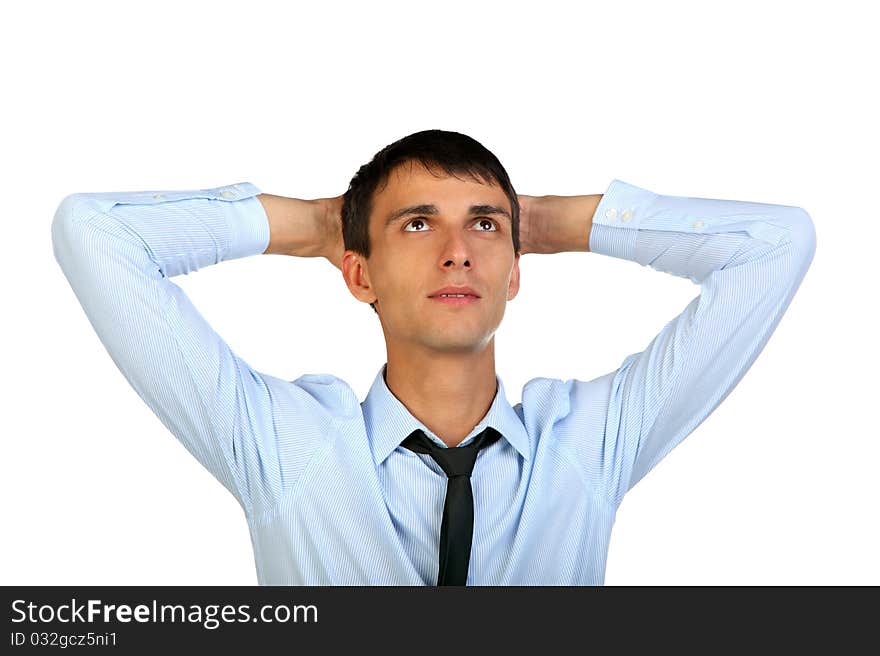 Portrait of a happy young man looking upwards in thought isolated background