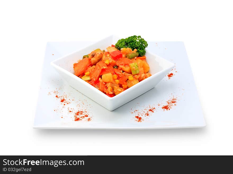 Vegetarian salad with fresh vegetables on a ceramic platter