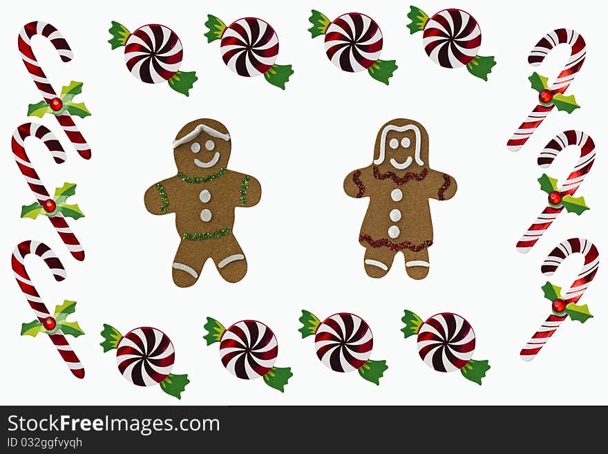 Gingerbread boy and girl and Christmas Candy isolated on a white background. Gingerbread boy and girl and Christmas Candy isolated on a white background