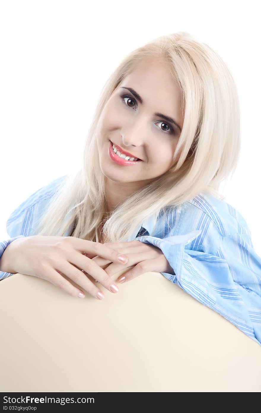 Woman dirinking tea smiling and looking at camera wearing formal clothes. Woman dirinking tea smiling and looking at camera wearing formal clothes