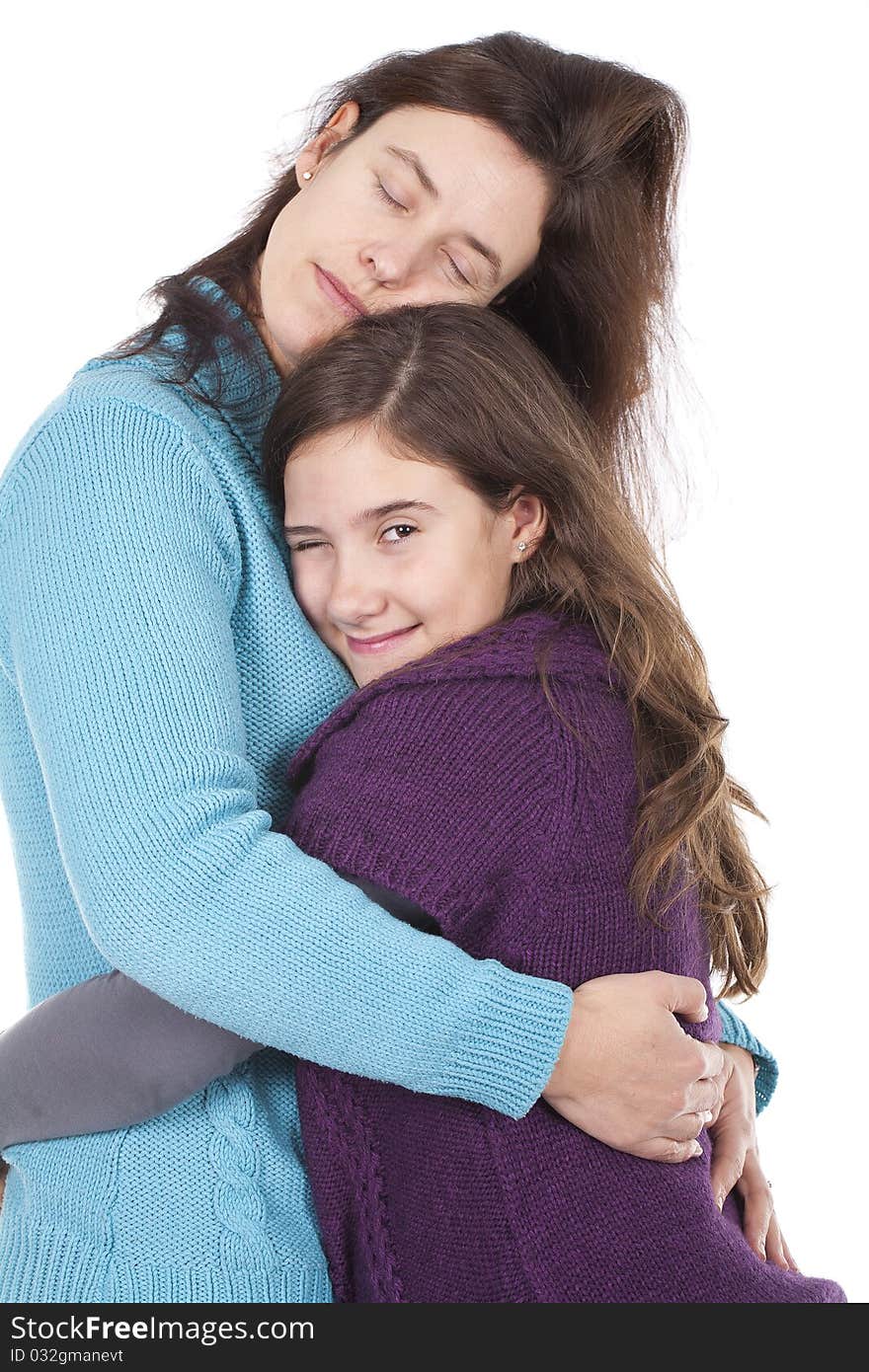 Mother and daughter hugging