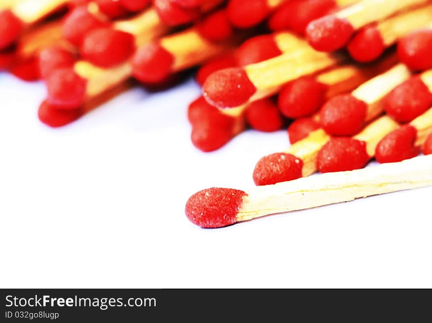 Wooden matches on white background