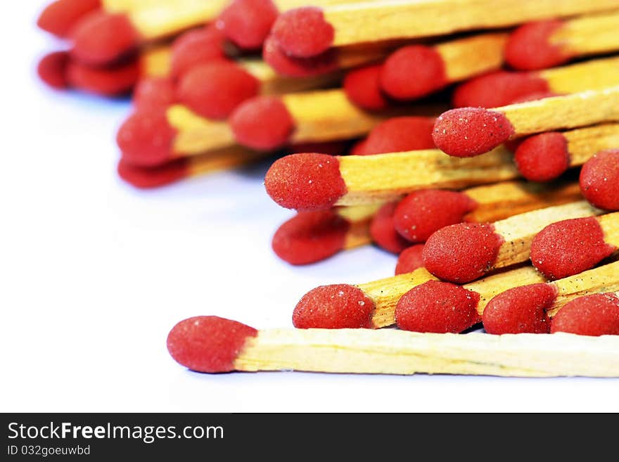 Wooden matches on white background