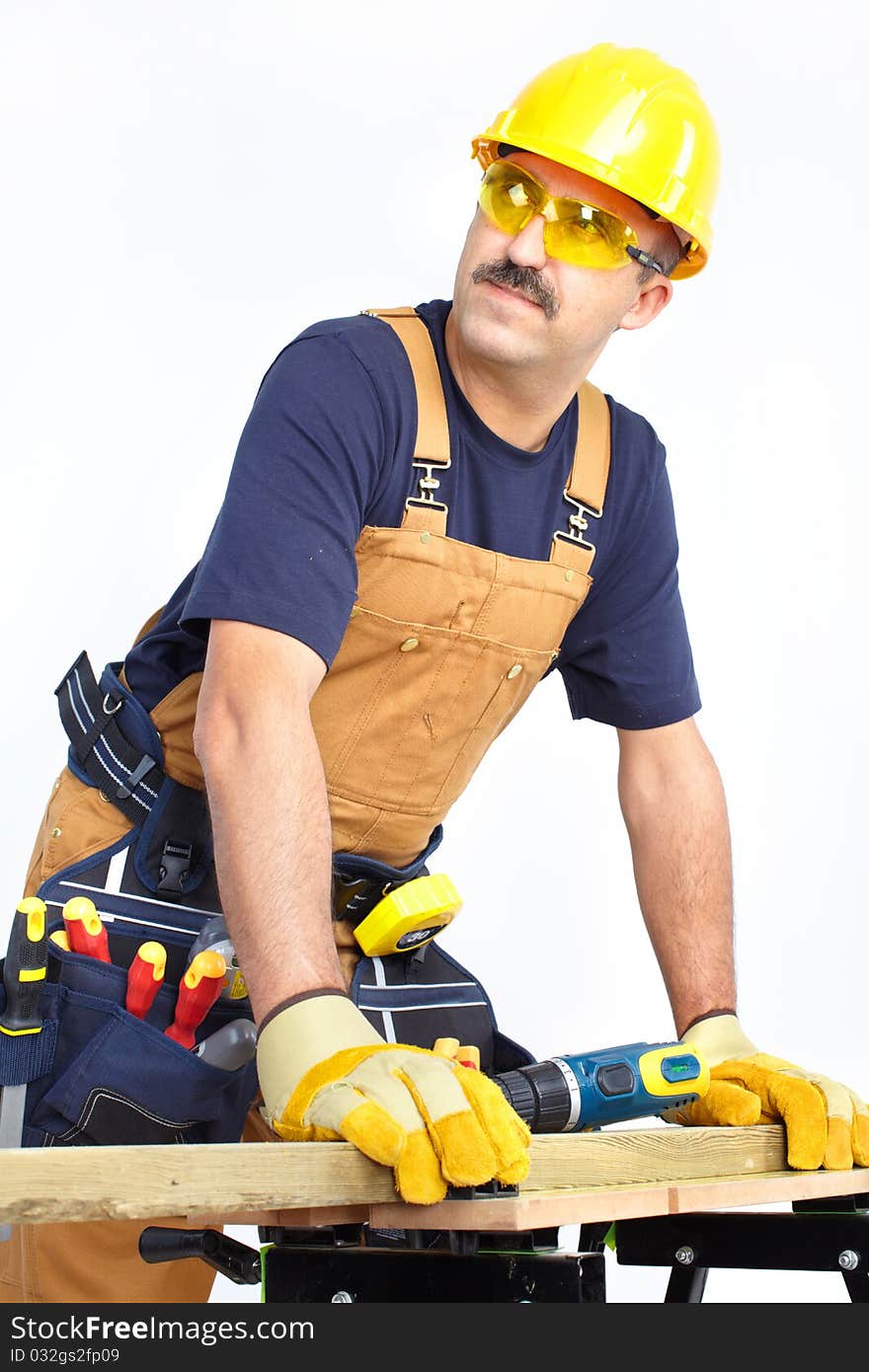 Mature contractor working. Over white background