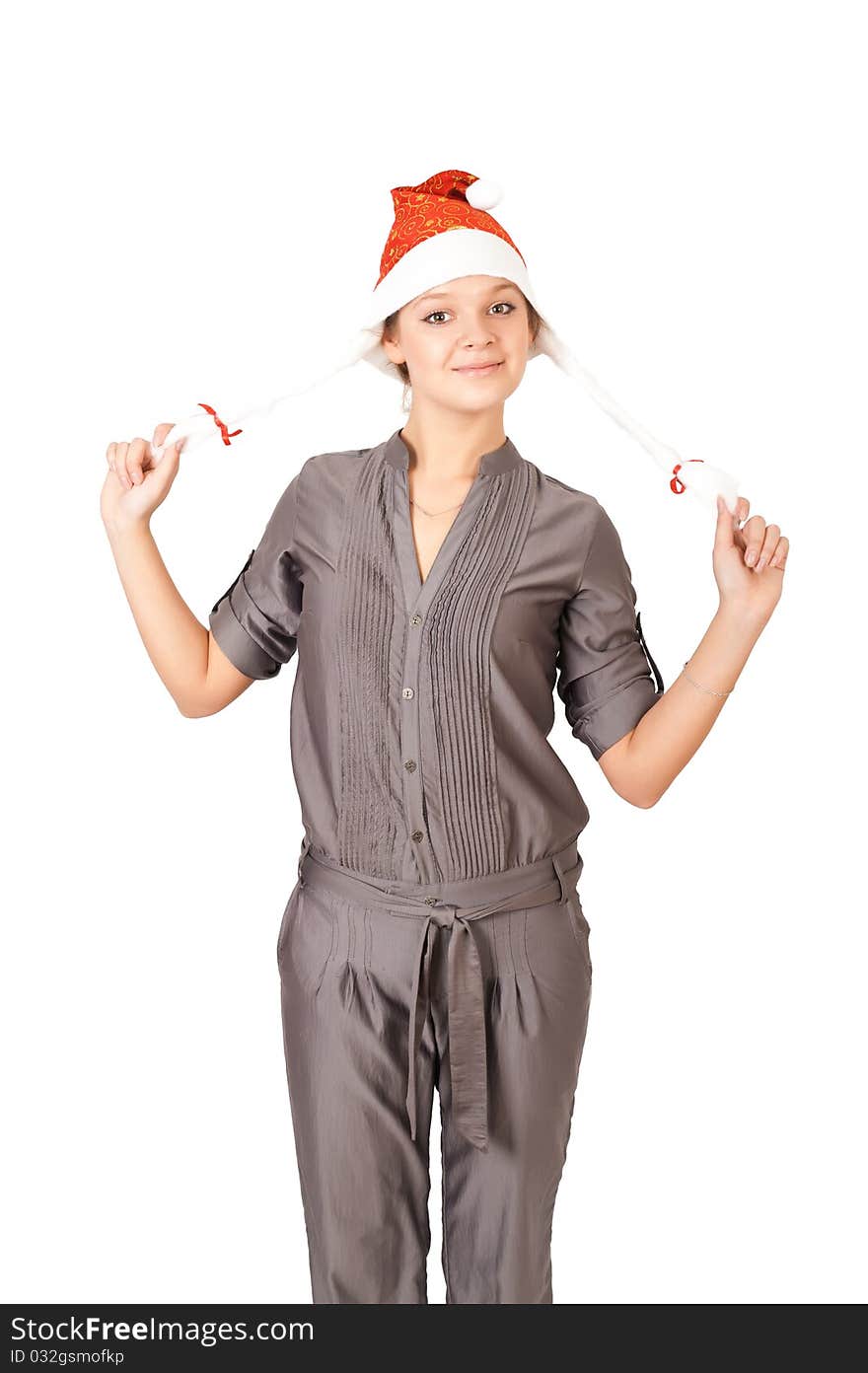 Young woman in a Santa Claus hat on white background