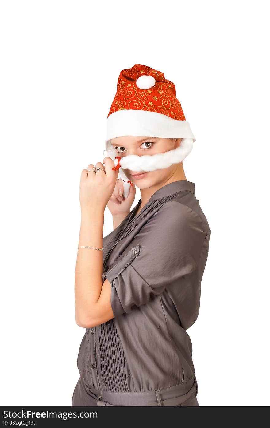 Young woman in a Santa Claus hat on white background