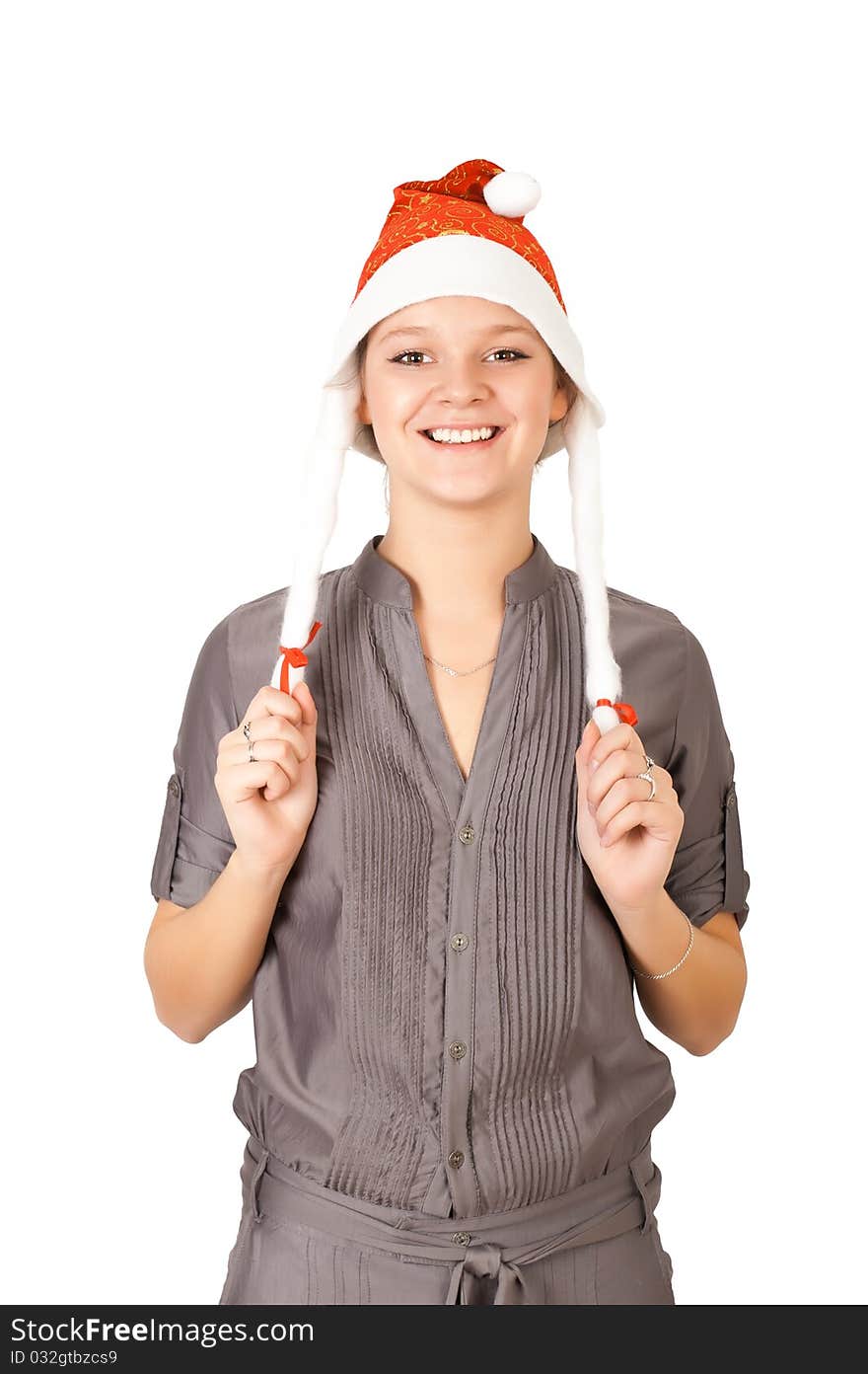 Young woman in a Santa Claus hat on white background