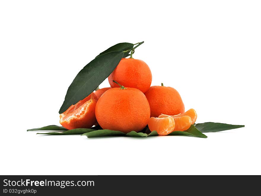 Tangerines with leaves on white background