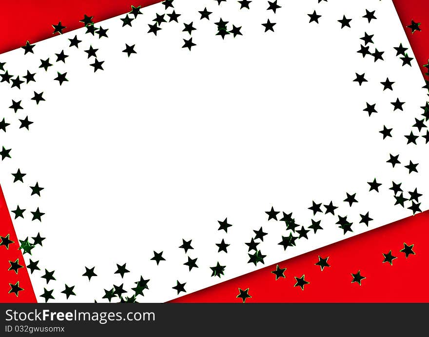 On a red background white greeting card with green stars. On a red background white greeting card with green stars