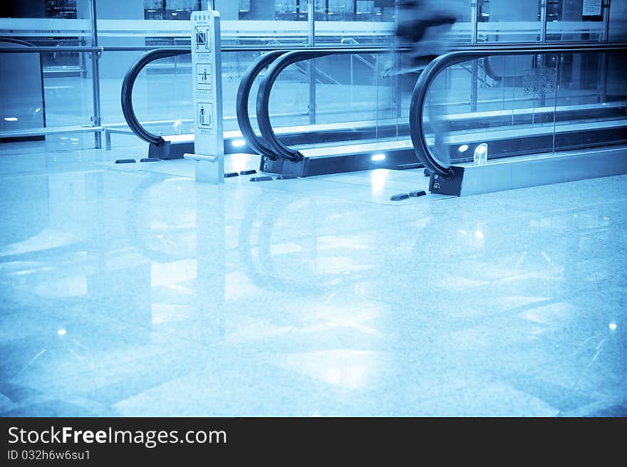 Airport Scene - People Walking Fast In The Airport