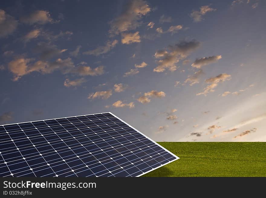 Solar cell on the green field with nice sky