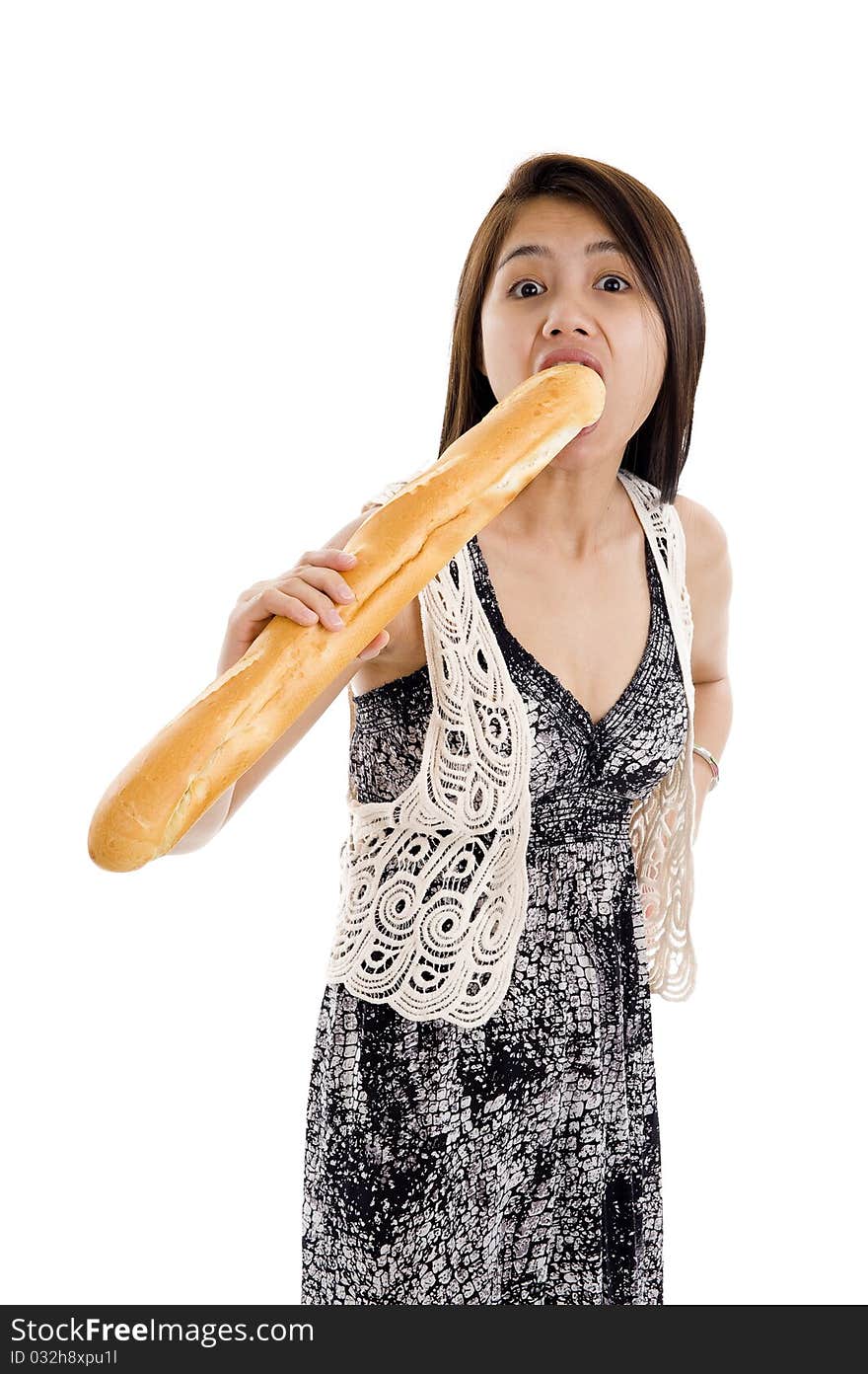 Pretty asian woman biting in a french bread, isolated on white background. Pretty asian woman biting in a french bread, isolated on white background