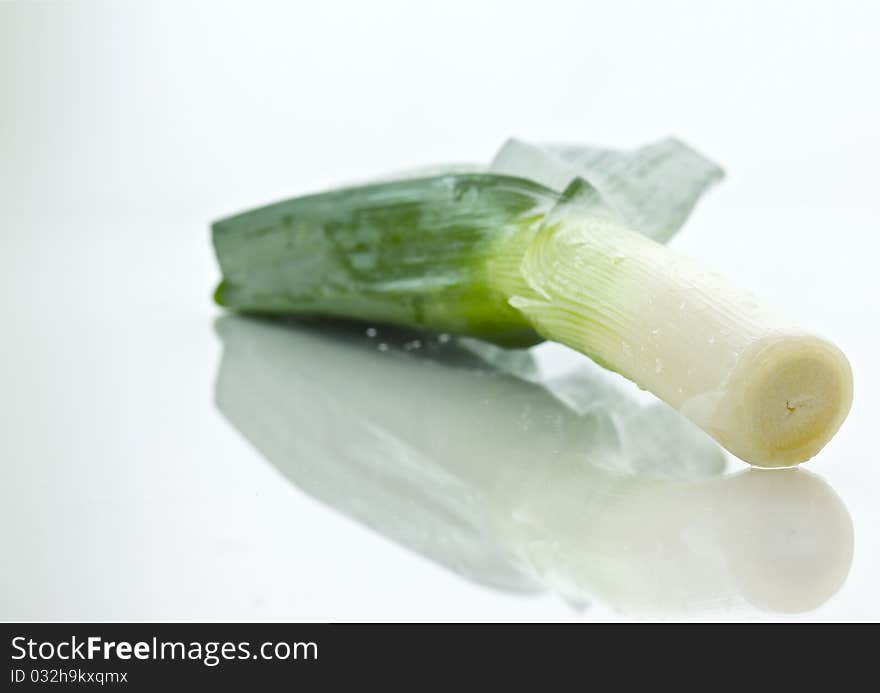 Close up of a group of a leek shot in studio. Close up of a group of a leek shot in studio.