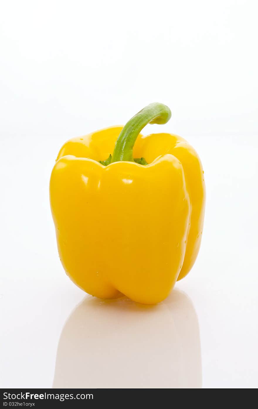 Close-up of organic yellow bell pepper, isolated in white.