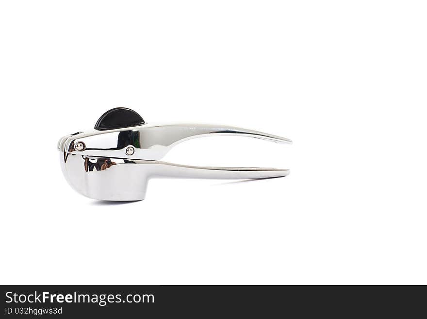 Garlic press isolated on white