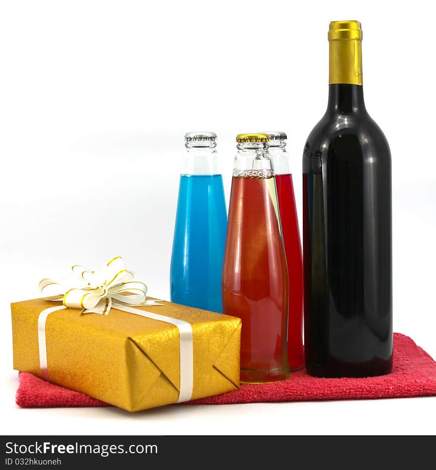 Wine bottle and gift isolated on white background