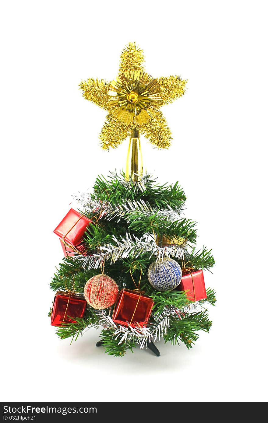 Decorated christmas tree isolated on white background