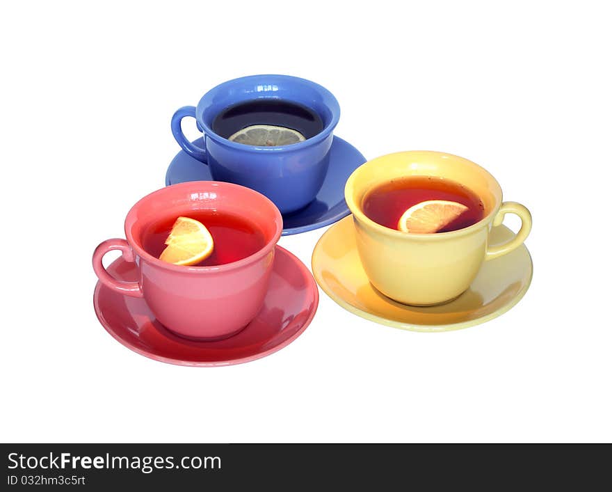 Three color cups of black tea with lemon isolated on white background with clipping path. Three color cups of black tea with lemon isolated on white background with clipping path