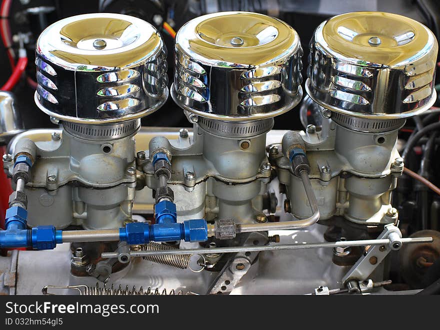 Classic custom car engine on a vintage automobile. Classic custom car engine on a vintage automobile.