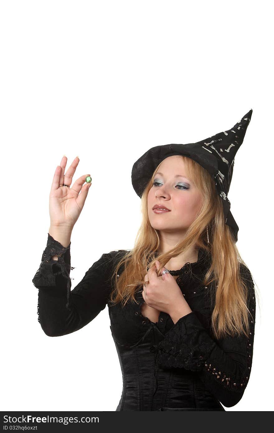 A young woman in a witch costume