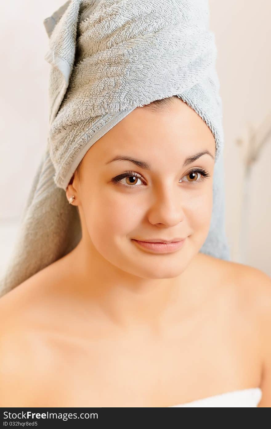 Portrait of young girl in towel