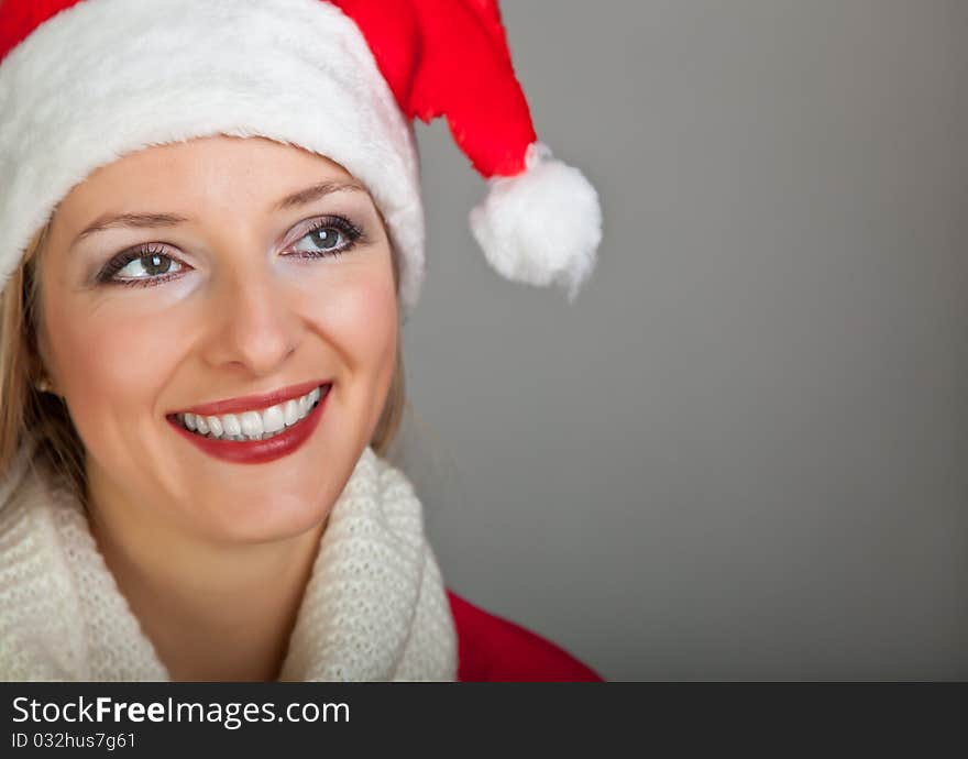 Woman In Santa Hat With Presents