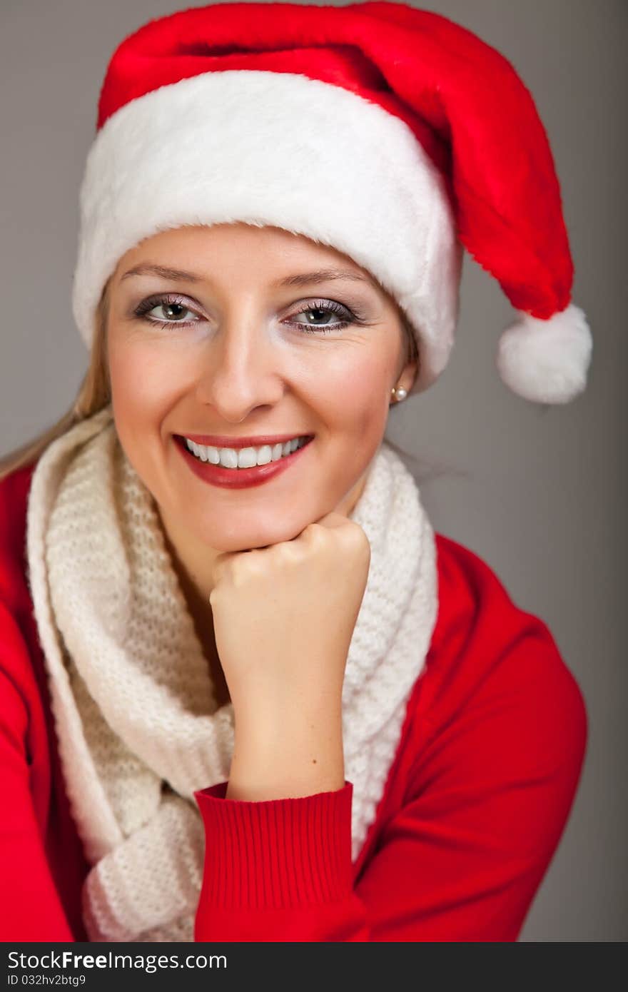 Woman In Santa Hat With Presents