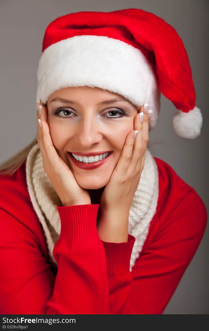 Woman In Santa Hat With Presents