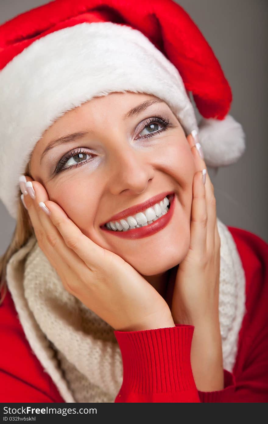 Woman In Santa Hat With Presents