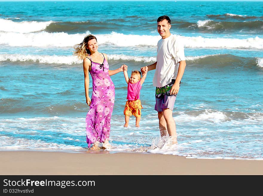 Family on the shore of the sea. Family on the shore of the sea