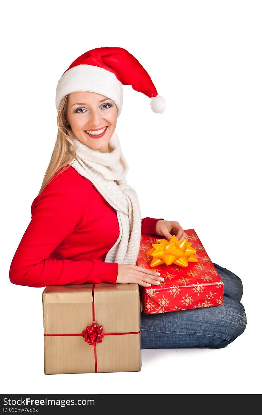 Woman in santa hat with christmas presents isolated on white background. Woman in santa hat with christmas presents isolated on white background