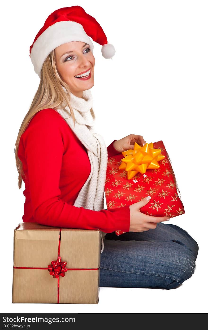 Woman in santa hat with christmas presents isolated on white background. Woman in santa hat with christmas presents isolated on white background