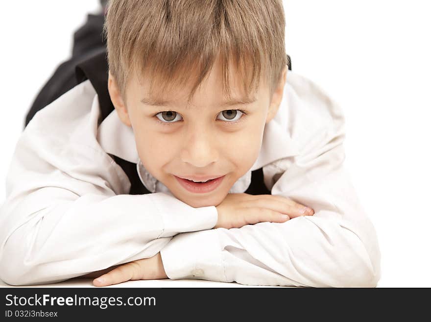 Kid laying flat on the floor