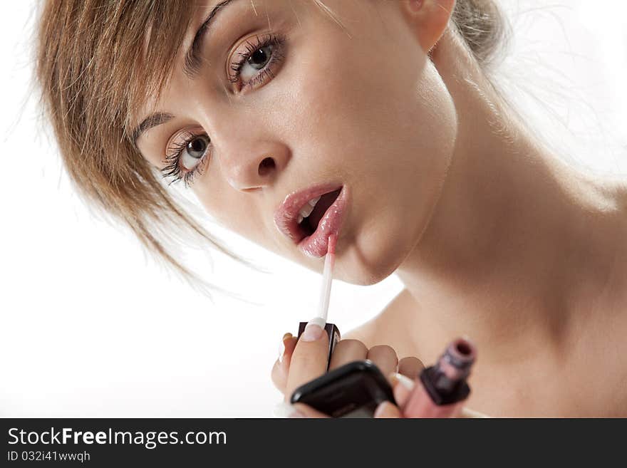 Woman Applying Liquid Glossy Lipstick