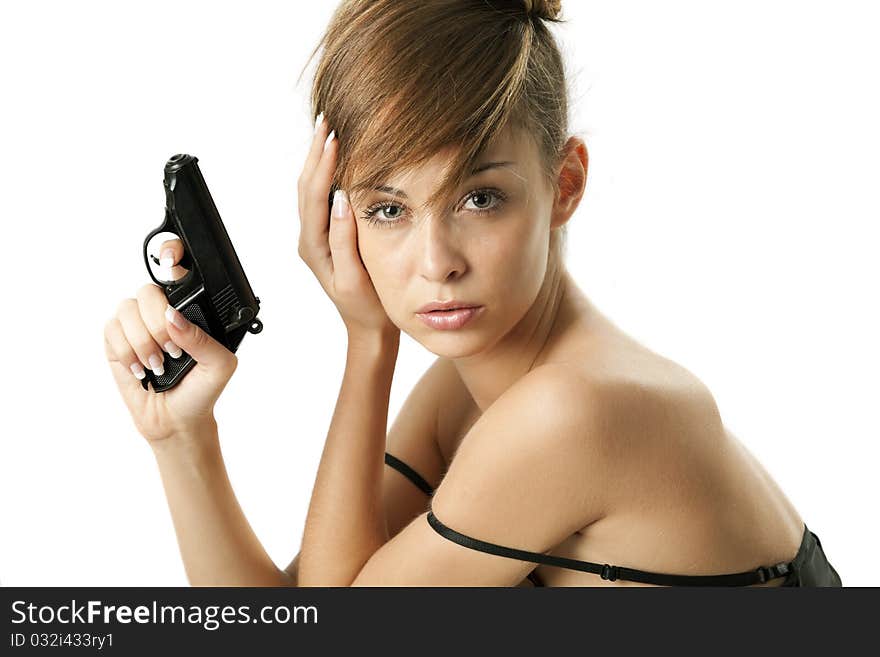 Attractive young woman with handgun over white