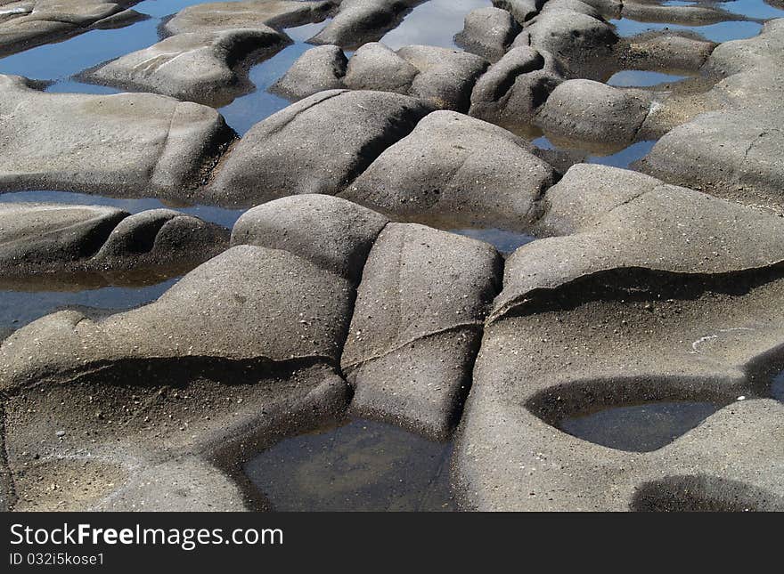 Stones and water pools texture