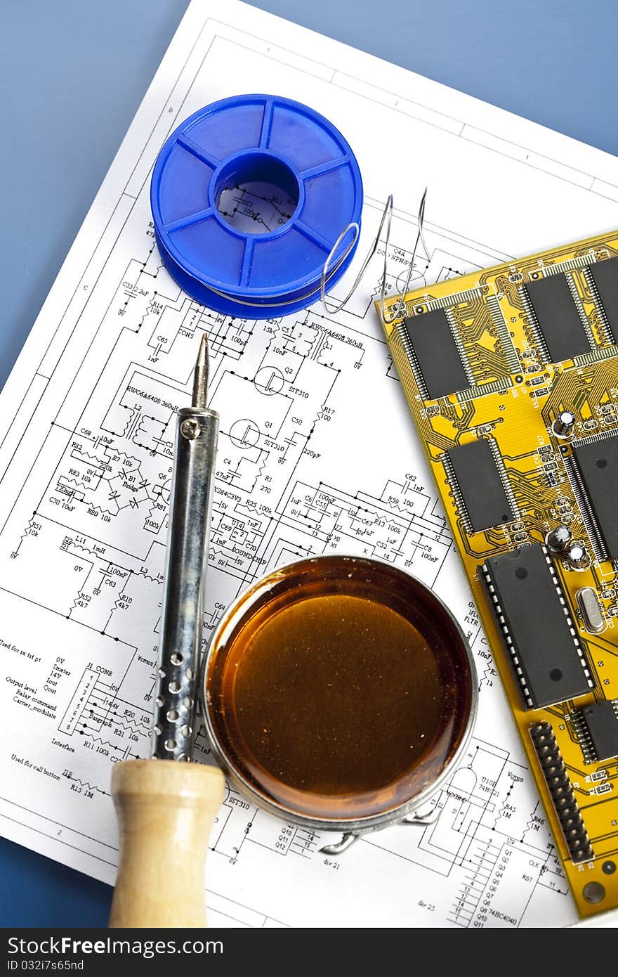 Electronic components on a schematic diagram background.