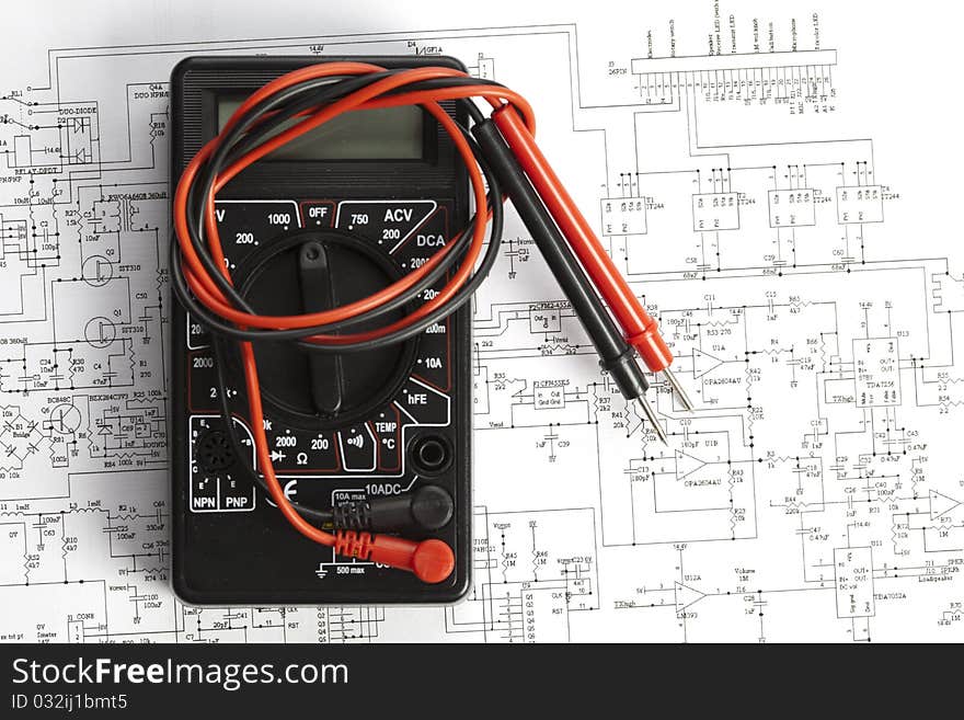 Electronic components on a schematic diagram background.