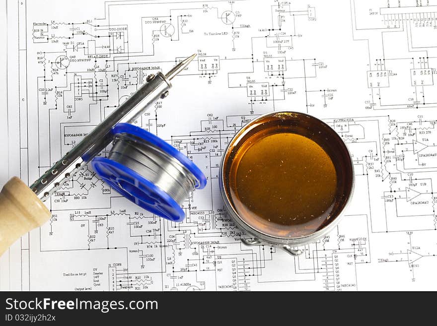 Electronic components on a schematic diagram background.