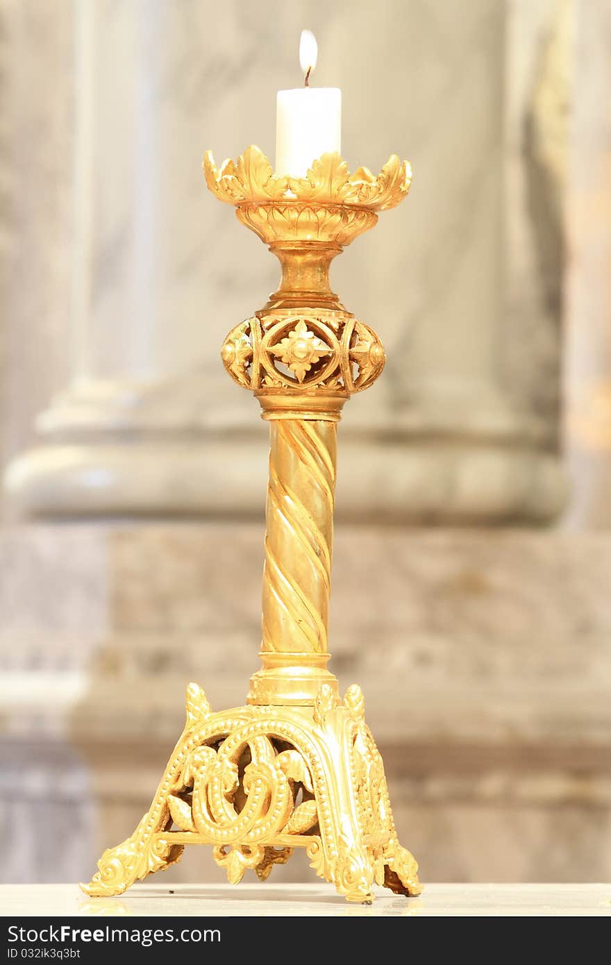 Candle And Golden Candlestick