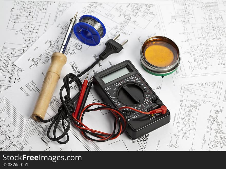 Electronic components on a schematic diagram background.