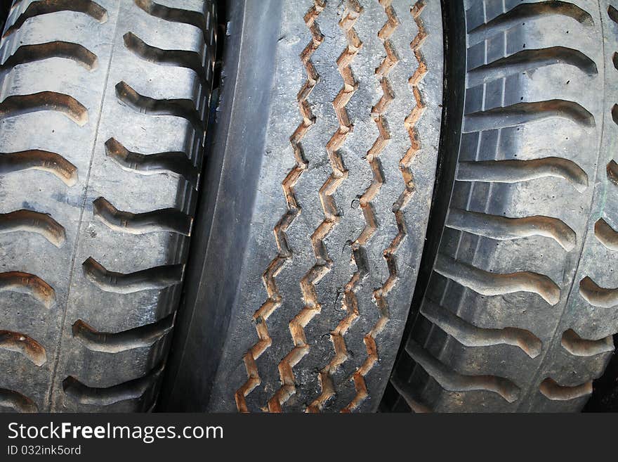 Old car tires in the second hand market. Old car tires in the second hand market