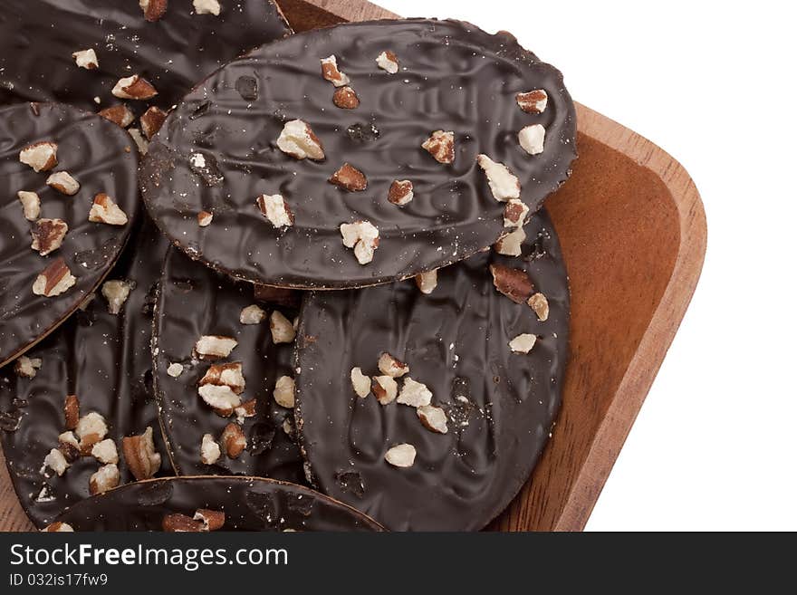 Biscuit dough with chocolate in a wooden bowl. Biscuit dough with chocolate in a wooden bowl.