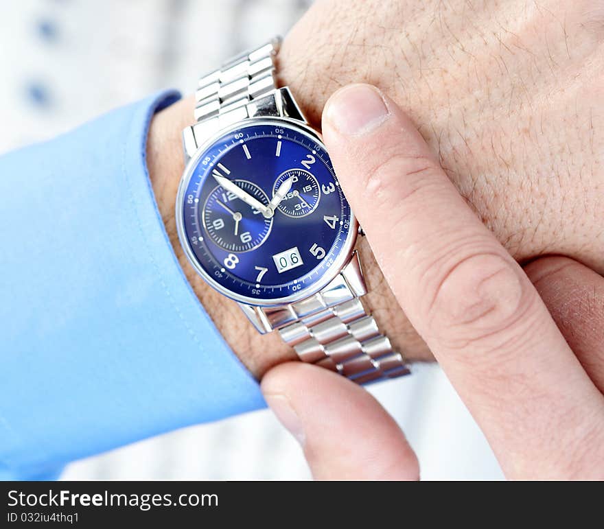 Businessman looking at the watch